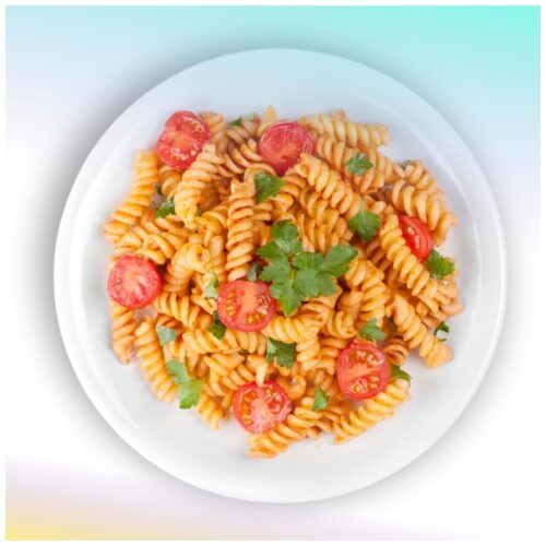 Cellentani con pomodori, rucola e briciole al sesamo, con rucola, olive taggiasche, sesamo e pane