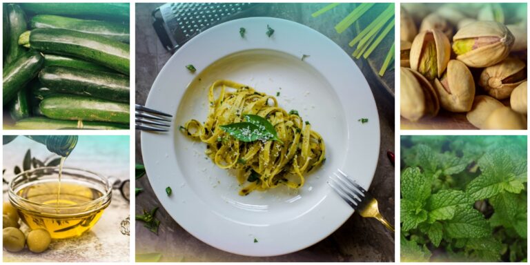 Pasta al pesto verde su un piatto bianco, circondata da zucchine, olio d'oliva, pistacchi e menta